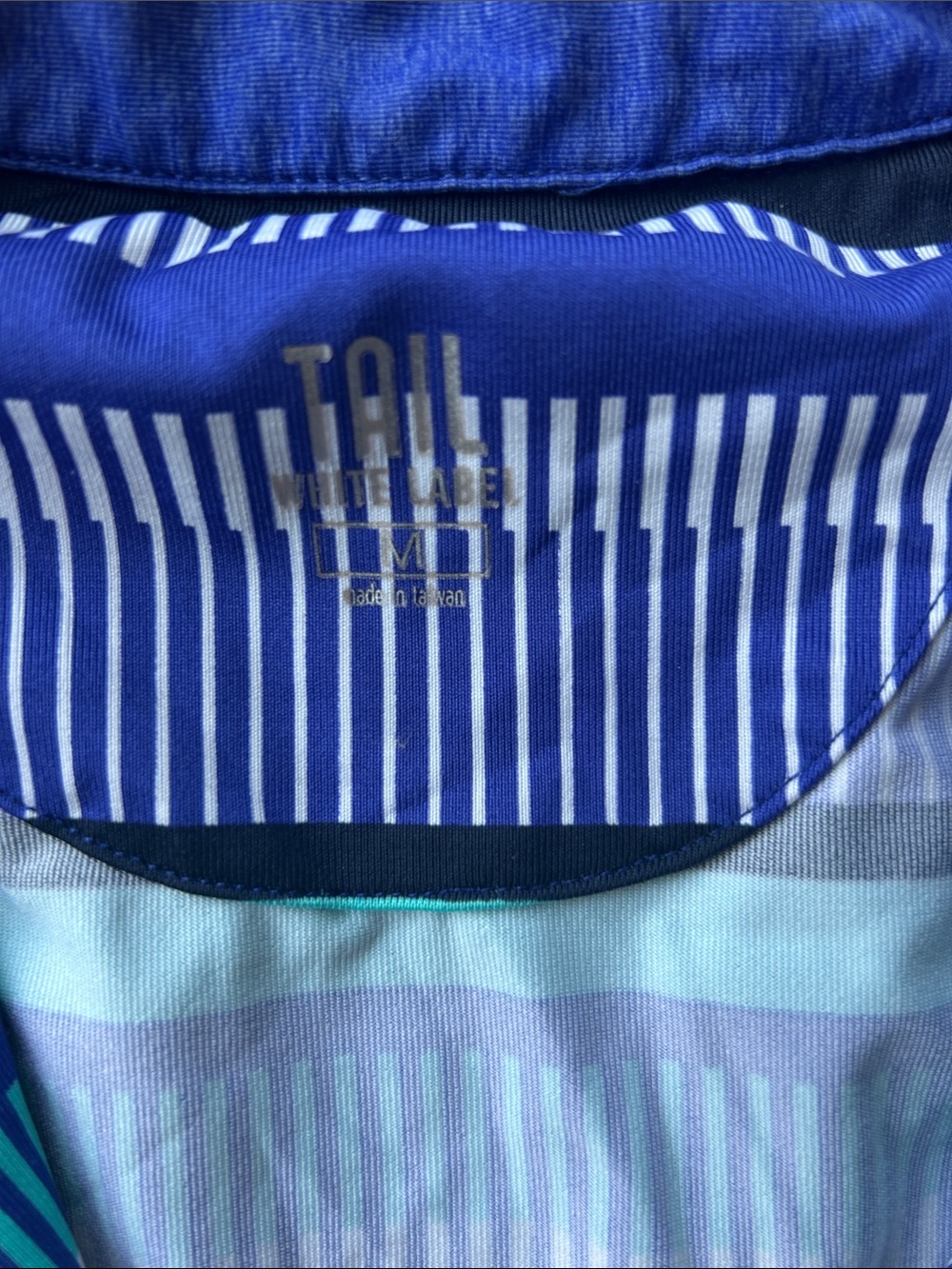 Tail Women’s Sleeveless Zip Polo in Navy, Teal & White - Picture 2 of 3